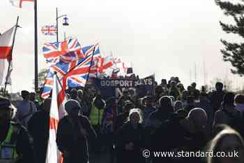 Hundreds join anti-migrant march near planned immigration removal centre