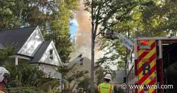 Neighbors report hearing explosion before fire engulfs Raleigh home