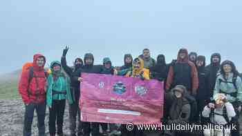 Hull dad’s climbing community raises thousands for charity