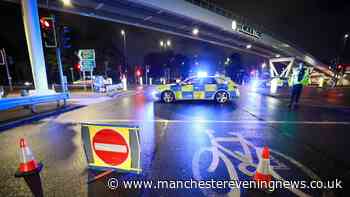Woman fighting for her life after police descend on major road near Manchester City's Etihad Stadium