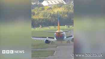 Moment plane veers off runway at Birmingham Airport