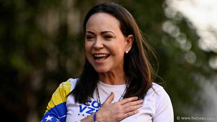 Venezuelan opposition leader makes surprise return home after nearly a year in exile