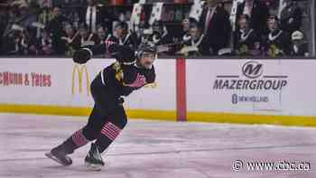 'Pink the Rink' event sees Brandon Wheat Kings skate on pink ice for breast cancer research