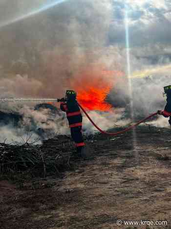Volunteer Fire crew with members from Roswell Correctional Center extinguishes brush fire