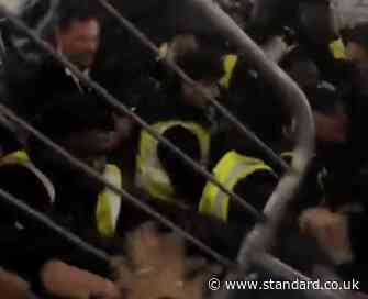 Fans try to break through security at Ballon D'or ceremony in London