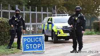 U.K. charges 2 men, accuses them of working on Iran's behalf in incident at airbase