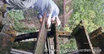 200-year-old waterwheel repaired after broken paddle jams historic wheel
