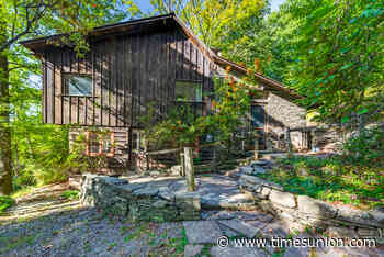 Tour this Woodstock home built by hand, shaped by imagination