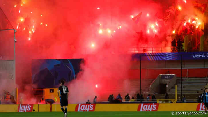 Lens fans banned from Anfield for Champions League clash with Liverpool after flares chaos