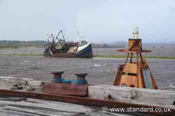 Coastal communities told to remain vigilant for floods as wind warnings lifted