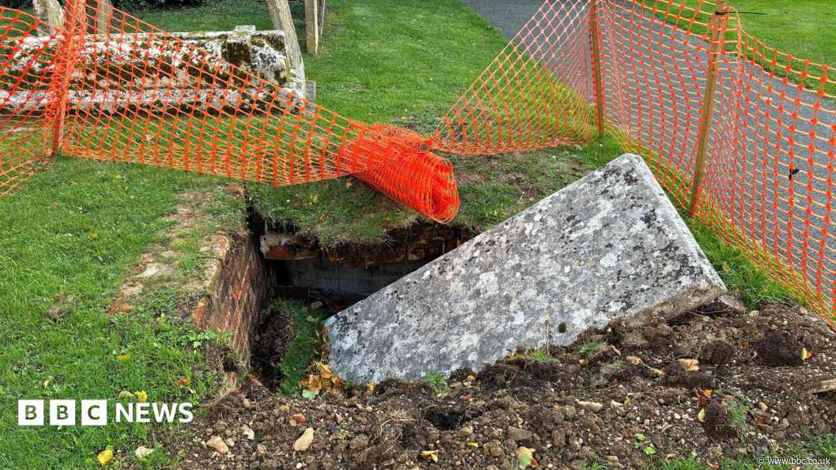 Vault collapses in church graveyard after storm