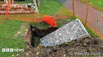 Vault collapses in church graveyard after storm