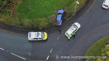 BMW crashes into garden fence in Halewood before drug driving arrest
