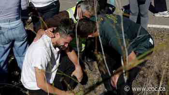 At least 64 dead in crash between 2 trains in central Spain, authorities say