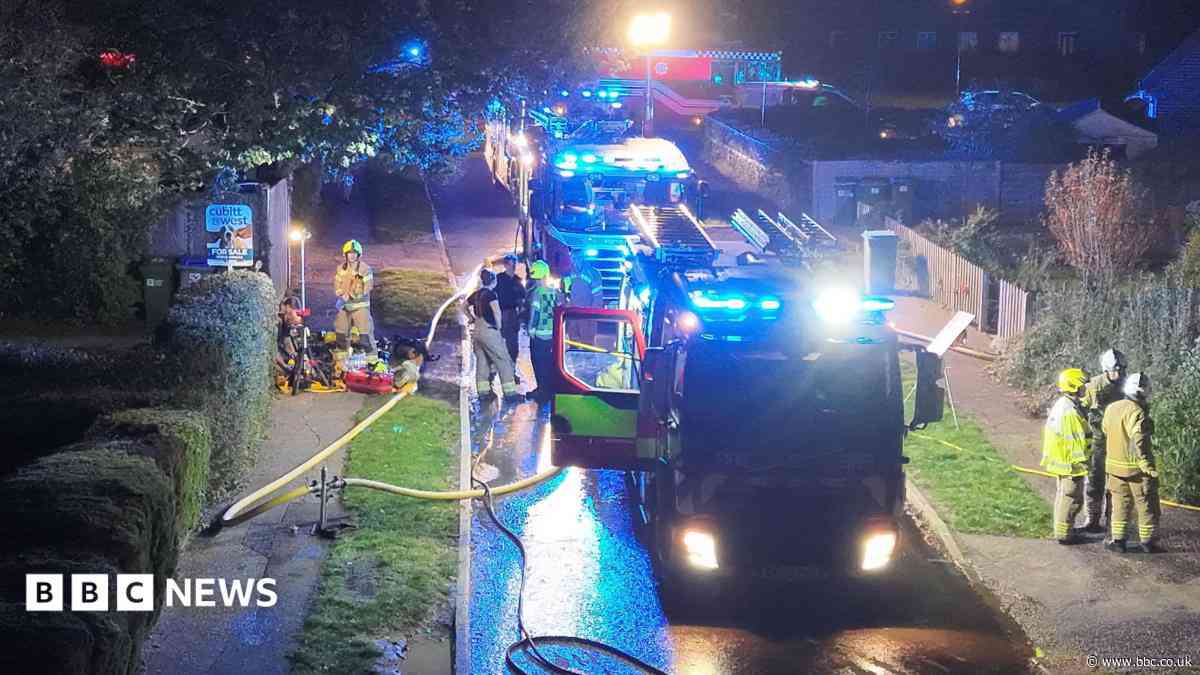 Fire crews tackle house blaze in village