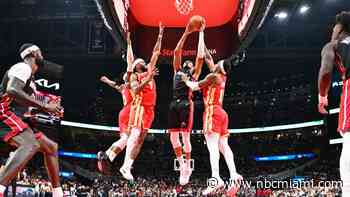 Giannis Antetokounmpo has 24 points, 18 rebounds as the Heat beat the Hawks 129-117 for first win