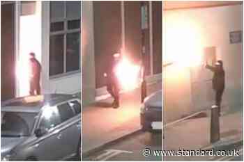 Horrifying moment man throws petrol bomb at migrant hotel in north London