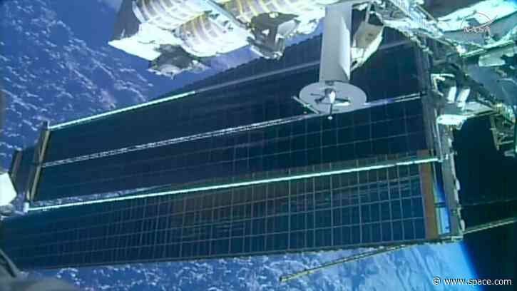 Astronauts deploy solar array on 100th US spacewalk by International Space Station crew members