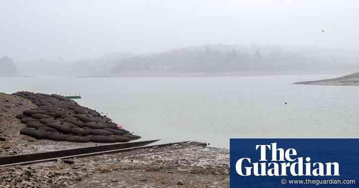 ‘You can see the water going down’: residents on edge as one of England’s worst-hit reservoirs dries up
