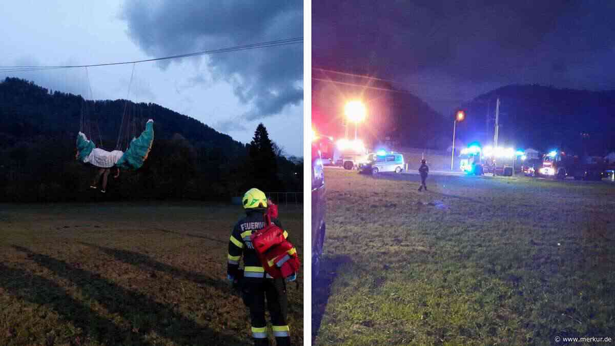 Deutscher Gleitschirmflieger hängt in Stromleitung fest – ganzes Dorf ohne Strom