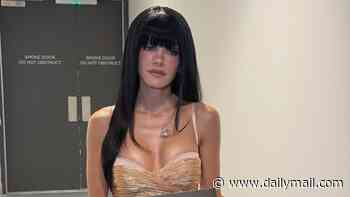 Lily Allen celebrates one year since the release of her comeback album West End Girl as she poses in a sexy mini-dress