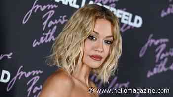 Rita Ora sizzles in push-up bra and big blonde hair for country icon transformation