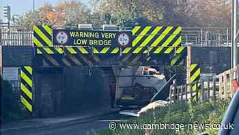 Van strikes Cambridgeshire city railway bridge